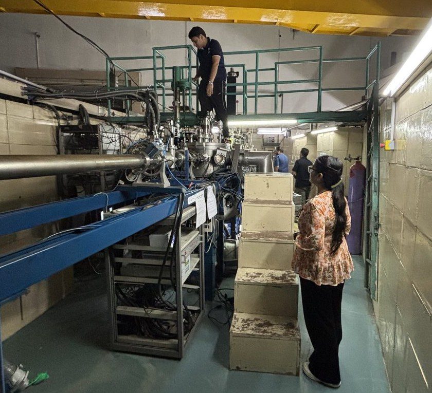 The beam hall at the Inter-University Accelerator Centre with the beamline running down the centre